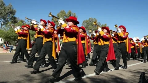 A marching band in a small town parade Stock Footage 56503916