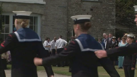 Marching British sea cadets at the Boconnoc House Lostwithiel, Cornwall, UK Stock Footage 105759954