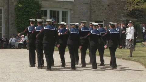 Marching British sea cadets at the Boconnoc House Lostwithiel, Cornwall, UK Stock Footage 106097891