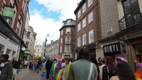 Marching at Cambridge Pride - Down historic streets with anchient buildings Stock Footage 338017791