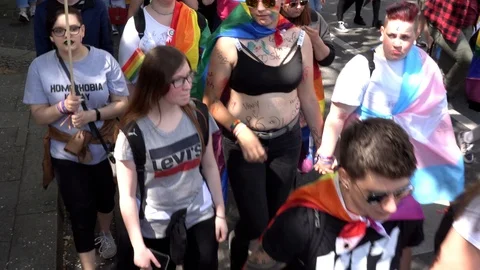 Marching people at the CSD Parade in Hanover Stock Footage 109448360