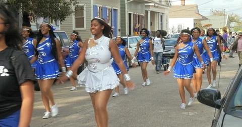 Mardi Gras High school dance team in Red Beans parade Treme New Orleans 動画素材 90726723