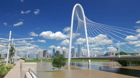 Margaret Hunt Hill Bridge w/ nice sky & clouds over Dallas skyline -real time Stock Footage