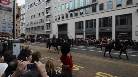 Margaret Thatcher's coffin passes crowds on the streets of London Stock Footage
