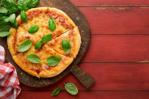 Margarita pizza. Traditional neapolitan margarita pizza and cooking ingredien Stock Photos