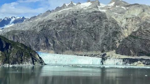 Margery Glacier, with the earthen wall on the right showing the remains of .. Stock Footage 329337634