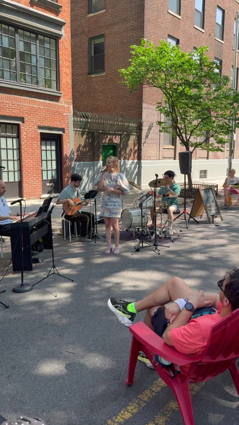 Mari Bell performs live on stage during a street fair at Tompkins Square Park 스톡 동영상 344008488
