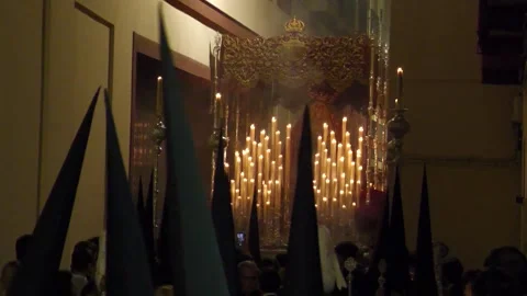 Maria Paso Moving Through Narrow Alley at Night in Seville Stock Footage 336025172