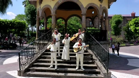 Mariachi playing in group on a square Stock Footage 156655792