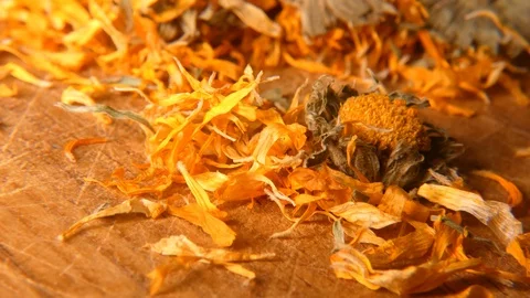 Marigold petals on a table Stock-Footage 112107927