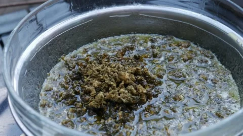 Marijuana Infusion Cooking Process Cannabutter Making Method Stock Footage 324805275