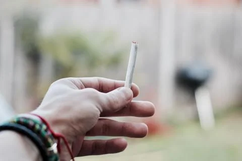 Marijuana joint in hand Stock Photos