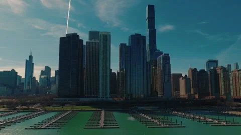 Marina Aerial with Empty Boat Docks Lake Michigan and Chicago Skyline Blue Sky Stock Footage 337441454