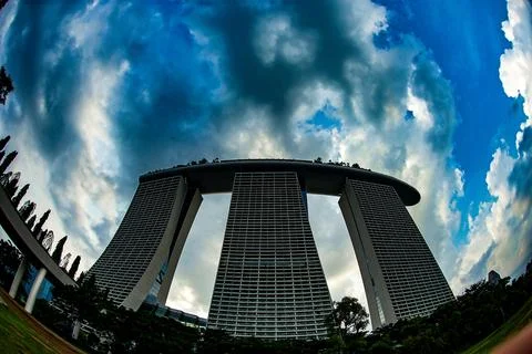 Marina Bay Sands and dramatic sky Stock Photos