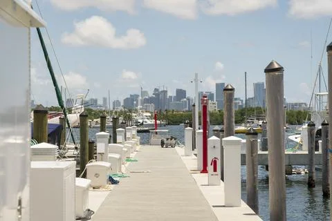 Marina docks with boxes on the side at the bay in Miami, Florida Stock-Fotos