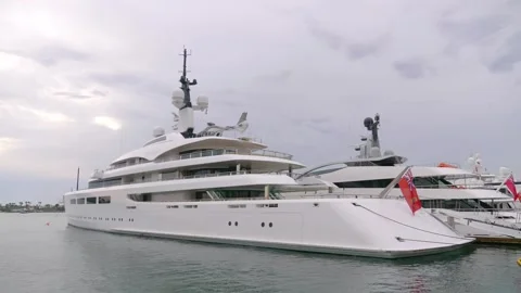 Marina Elegance: Yachts Moored Gracefully in 4k slow motion 60fps Stock Footage 280566547