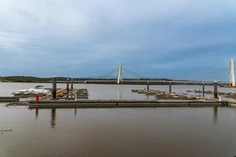 Marina Pontoons with Cable-Stayed Bridge in Background Stock Photos