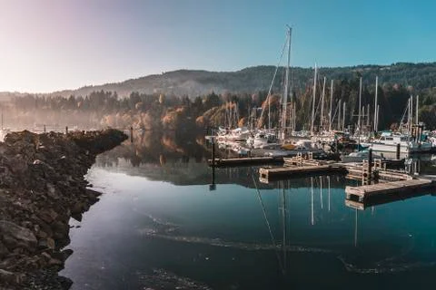 Marina reflection on the island Stock Photos