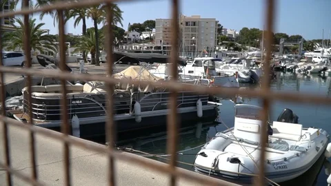 Marina seen behind grids Stock Footage 128349841