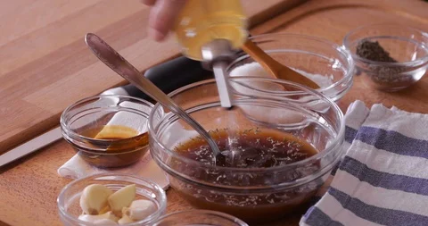 Marinade preparing, adding apple vinegar, close-up Stock Footage 106947308