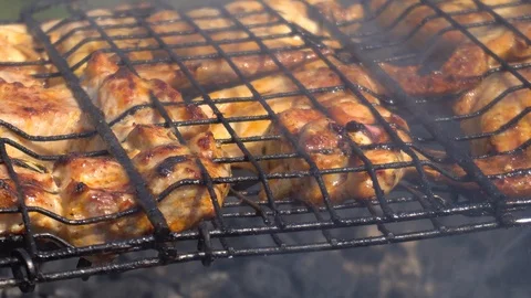 Marinated Chicken and beef kebab on grill rack Stock Footage 89970459