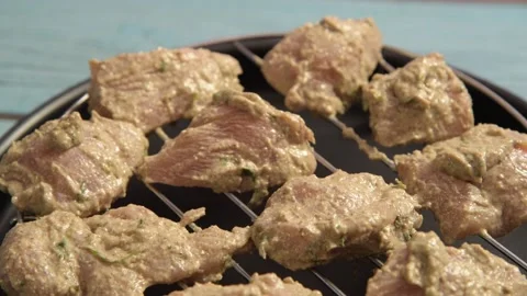 Marinated chicken on a grill Video stock 166107517