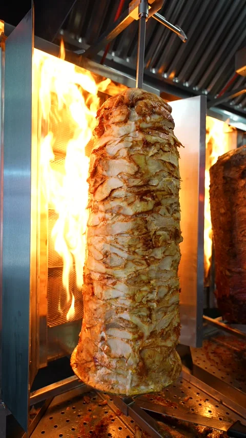 Marinated Chicken Shawarma Cooking Over Open Flames Stock Footage 340009230