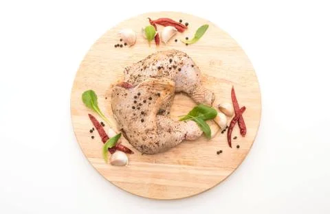 Marinated chicken thigh Stock Photos