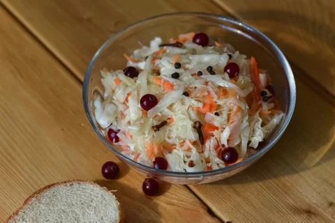 Marinated cranberries in cabbage Stock Photos