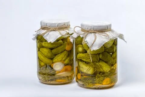 Marinated cucumbers on a white background Stock Photos
