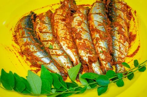 Marinated fish ready to be fried Fotos Stock