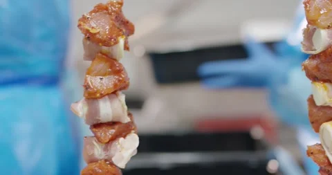 Marinated meat skewer with bacon in food production room, Static Shot Vídeo Stock 340031953