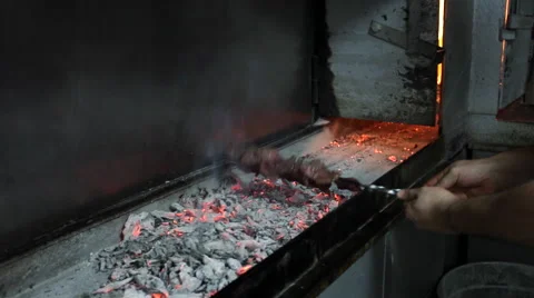 Marinated meat on a skewer cooked on fire Stock Footage 44230687