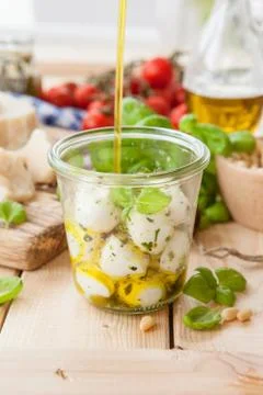Marinated mozzarella balls Stock Photos