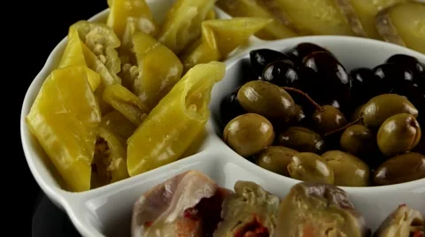 Marinated Pickled (eggplant, cucumbers, turnips, olives), loop Stock Footage 61707853