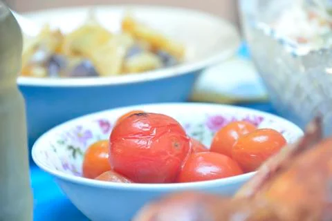 Marinated tomatoes in plate Stock Photos