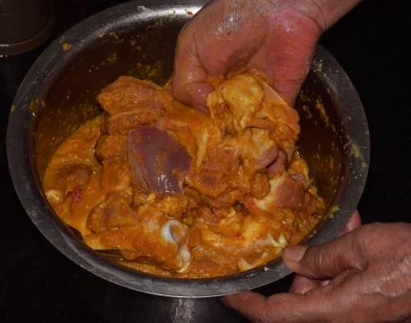Marinating Lamb or Mutton Foto stock