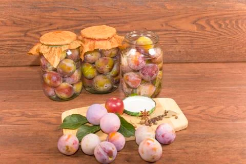 Marinating plums Stock Photos