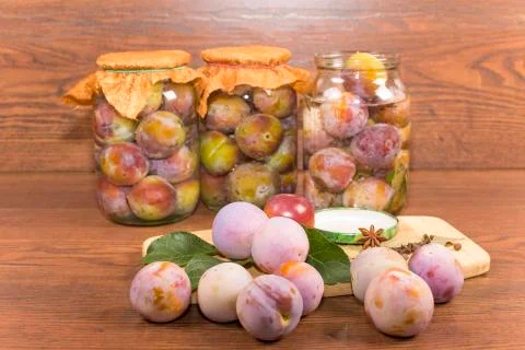 Marinating plums Stock Photos