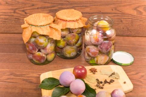 Marinating plums Stock Photos