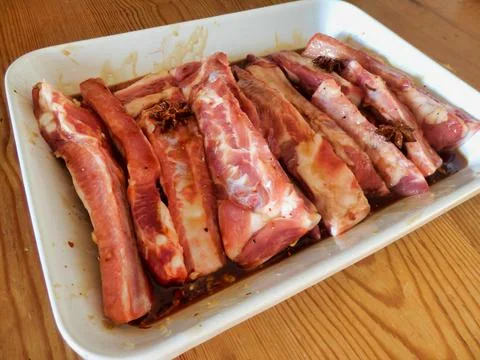 Marinating Spare Ribs. Stock Photos