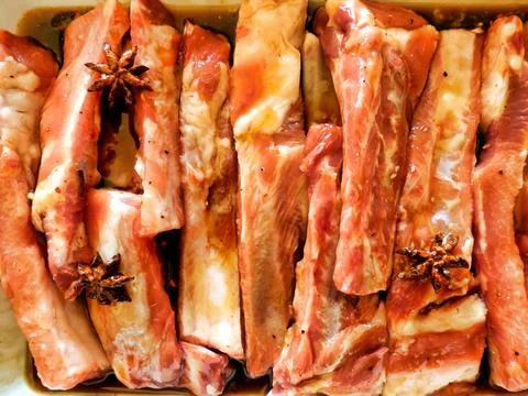 Marinating Spare Ribs. Stock Photos