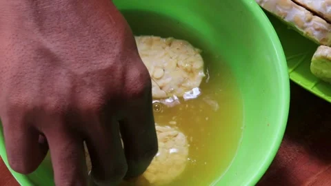 Marinating tempeh Stock Footage 342790065
