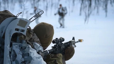 Marine aiming weapon during exercise White Claymore, Norway Stock Footage 103588741