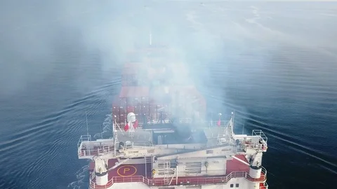 Marine air pollution Aerial Smog with a cargo ship. Diesel exhaust emission Stock Footage