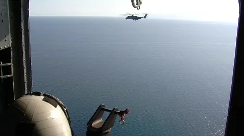 Marine CH-53 Helicopters flying over Ocean (HD) Stock Footage