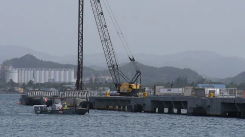 Marine construction pylon hammer and service diving boat Stock Footage 39569331
