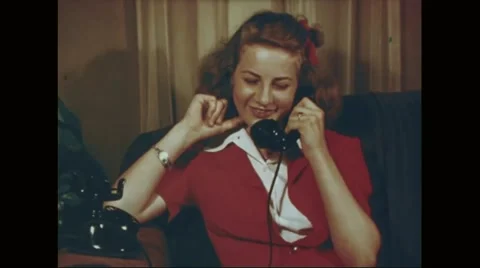 Marine Corp Will Kinney's sister sitting and talking on phone Stock Footage