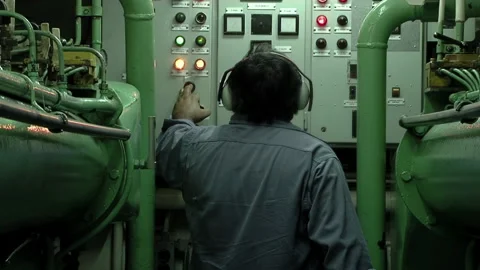 Marine Crew Member Operating Machinery Controls Inside Ship Engine Room  Stock Footage 150522017