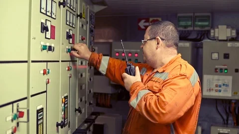 Marine Engineer working on radio communication at Engine Control room Stock Footage 120616433